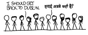 same standing stick figure characters. one says 'I should get back to Dublin', one says, in Hindi, 'Where's the airport?'